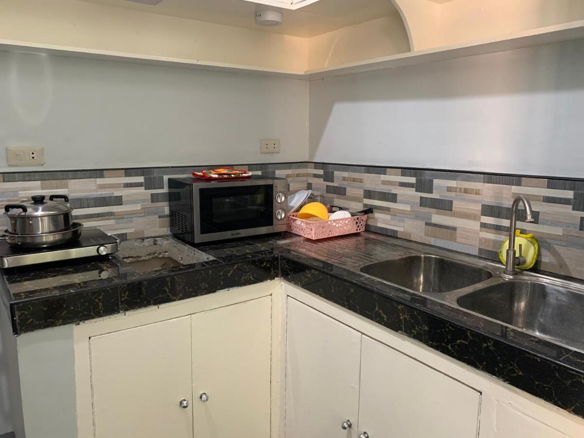 Beinte Singko De Marso Apartments Candon Bagian luar foto